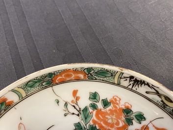 Two Chinese famille verte cup stands, a teapot and a plate, Kangxi